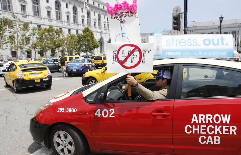 Lyft debuted in Sacramento, and there is opposition from the taxi industry. Pictured is San Francisco taxi driver Joel Sanchez, who showed his opposition to Lyft on July 30, 2013. 