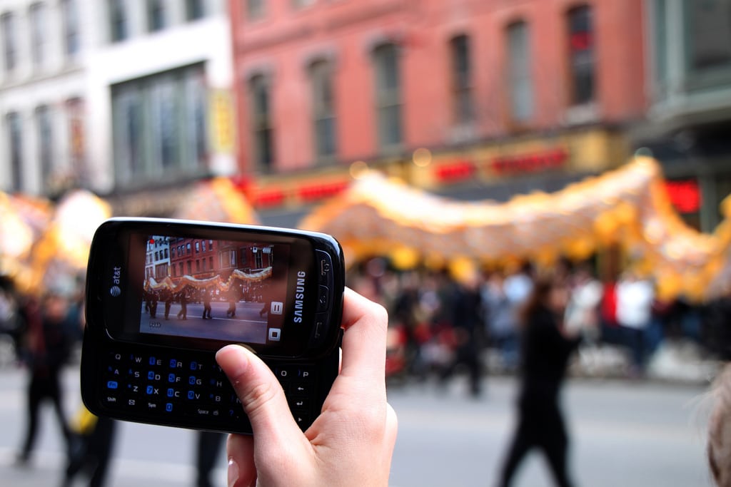 Someone takes a video of the annual Chinese New Year parade in Washington, D.C.