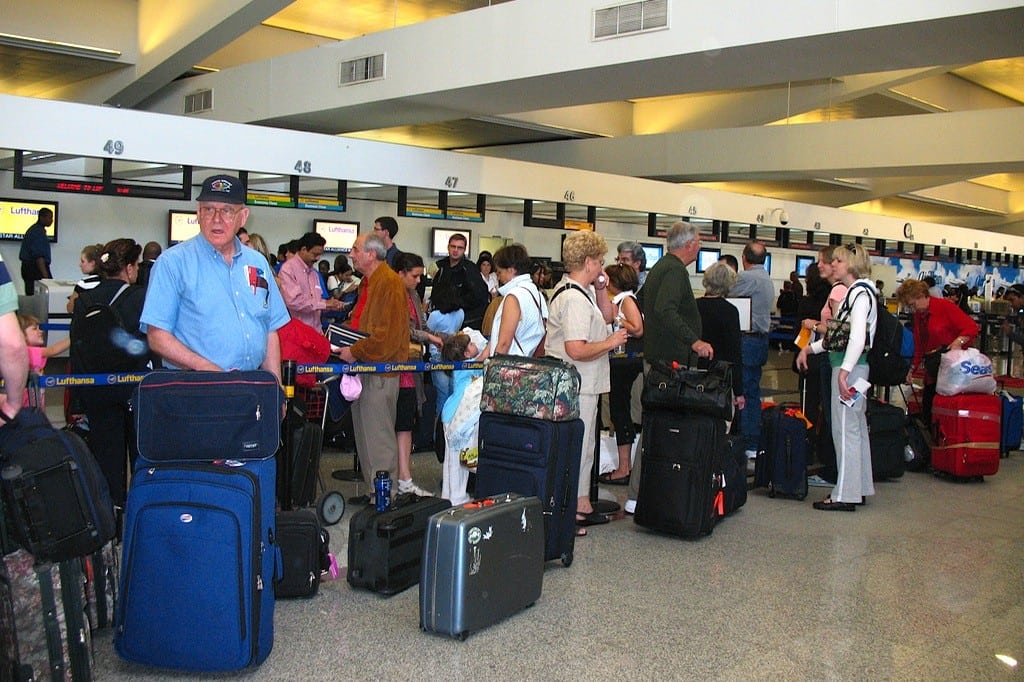 Delta Air Lines' passengers wait to check bags at Hartsfield-Jackson Atlanta International Airport. 