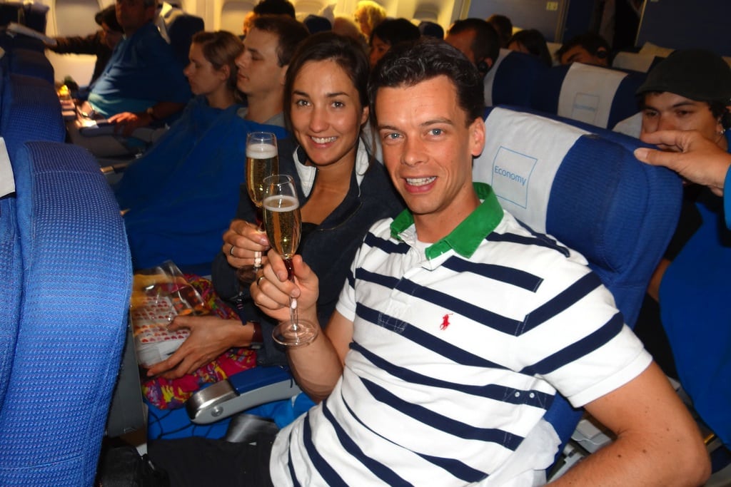 KLM surprises newlyweds on a flight to Bali with champagne in special wedding glasses. 