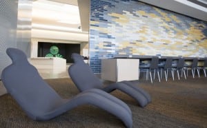 Lounge chairs are a seating option for relaxation in United's new Boarding Area E at San Francisco Airport Terminal 3. United Continental Holdings