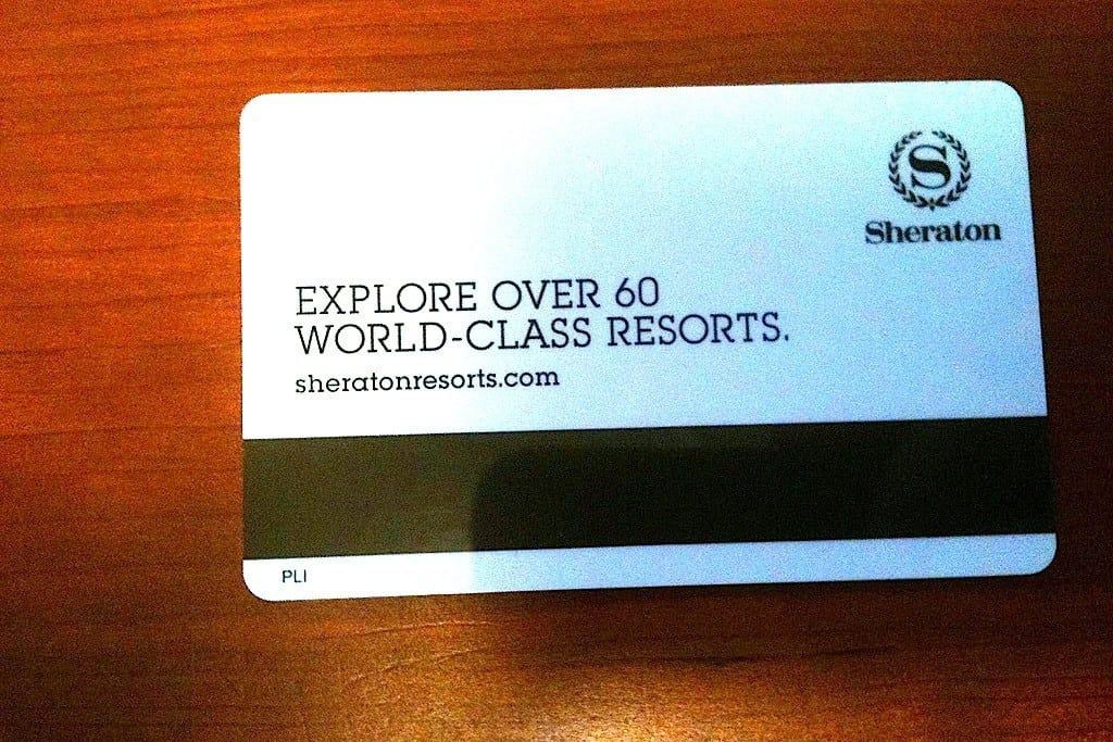 The back of a room key for a room at a Sheraton Hotel. 