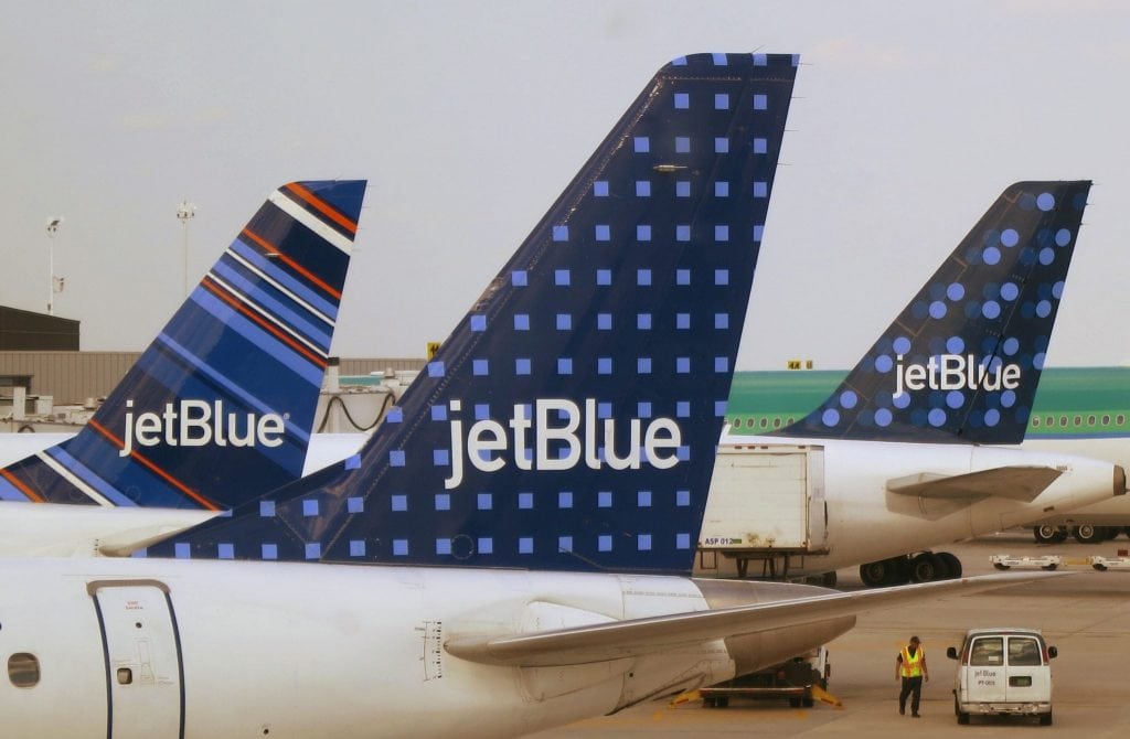 JetBlue Airways aircraft are pictured at departure gates at John F. Kennedy International Airport in New York. 
