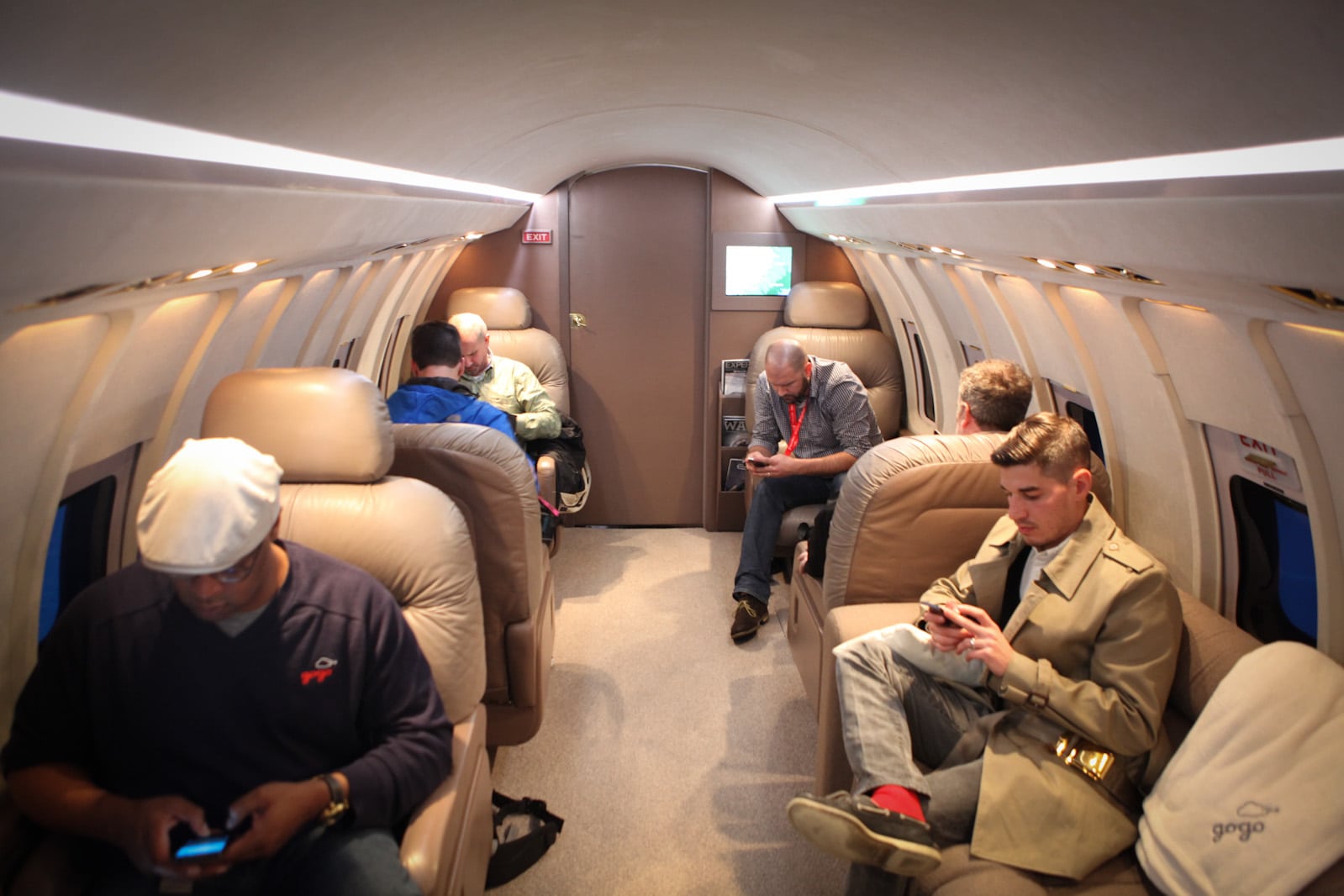Gogo is offering a years' worth of free Wi-Fi with the purchase of certain Samsung tablets. Pictured, community members try out the Gogo inflight wireless on the SXSW Challenger 600. 