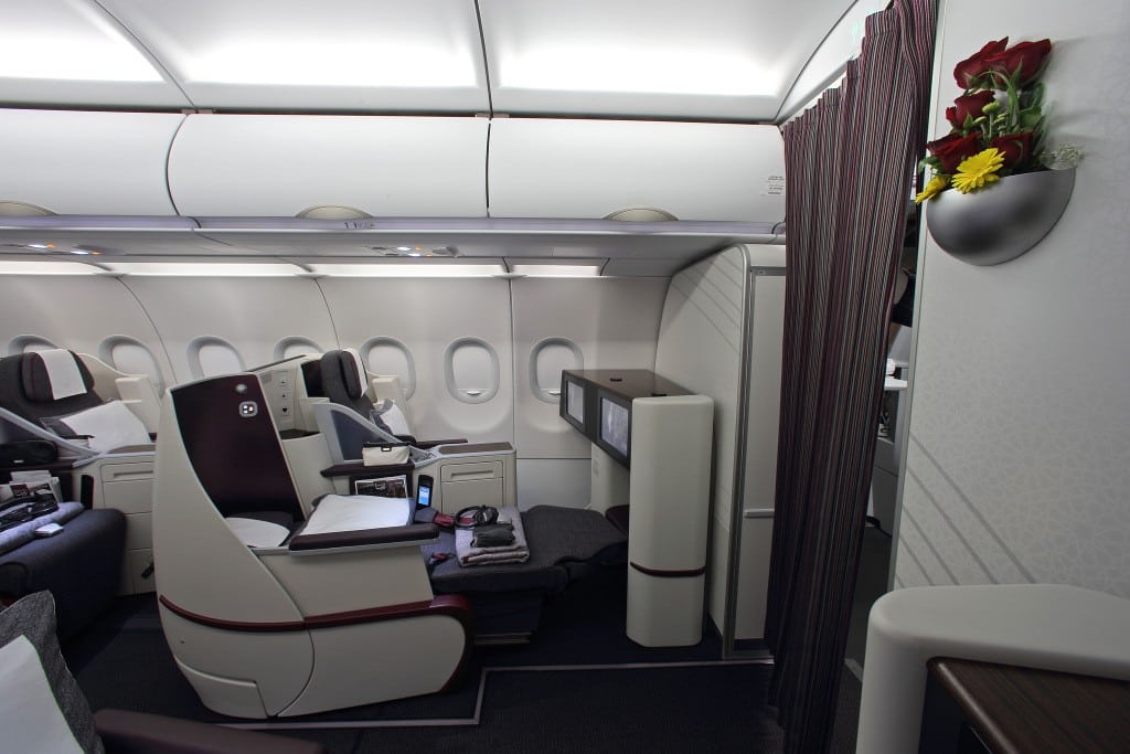 Business class seats on Qatar Air. Cheaper business class seats and radical changes to how status is earned in loyalty programs make seats like this smarter for frugal flyers. 