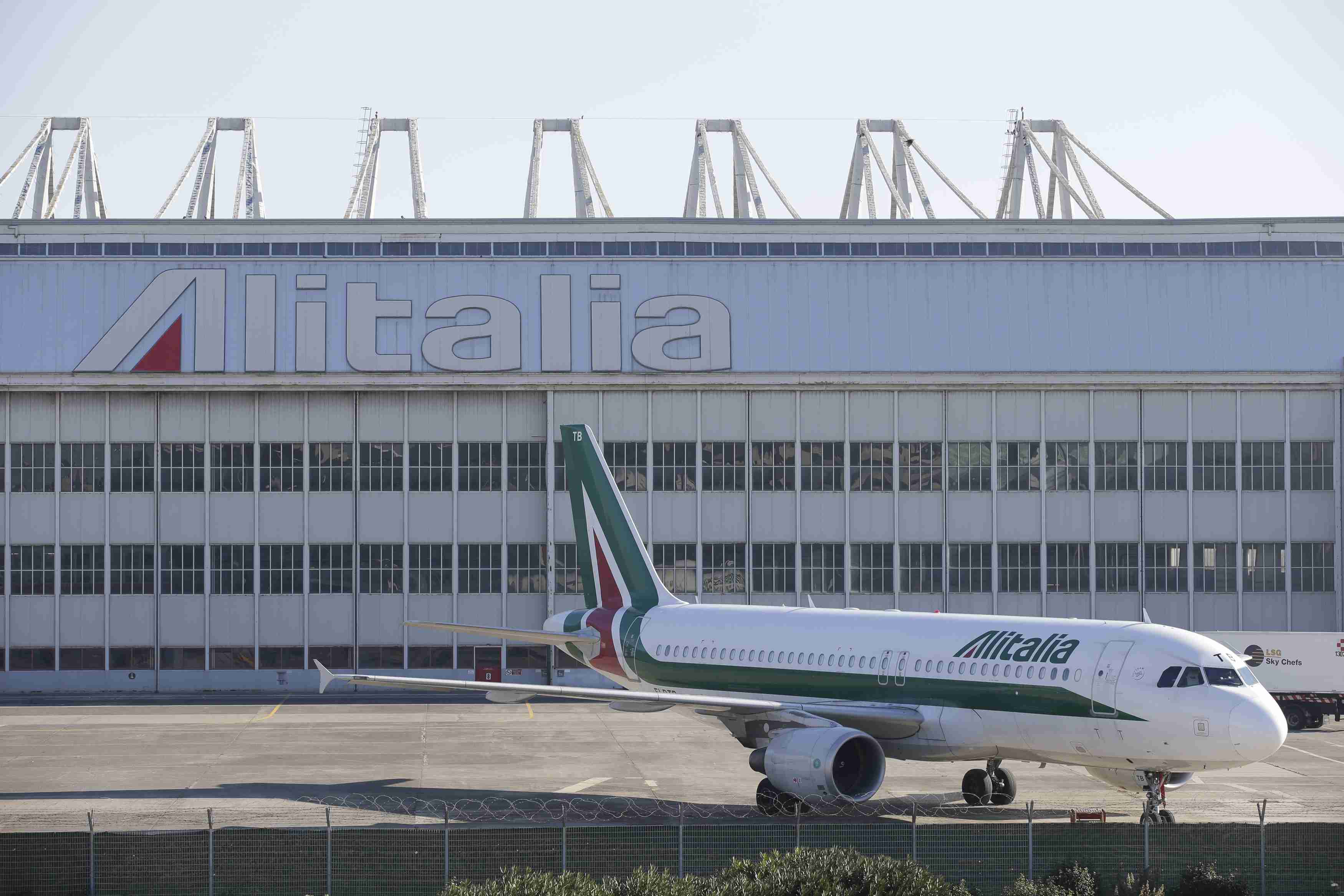 An Alitalia plane is parked on the tarmac at Fiumicino international airport in Rome. The airline and Delta will resume flights from New York and Atlanta in December 2020. 