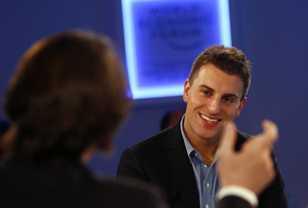Brian Chesky, Chief Executive Officer of Airbnb smiles during a session at the annual meeting of the World Economic Forum (WEF) in Davos. His company has lost two political battles in two weeks in two of its most important markets. 