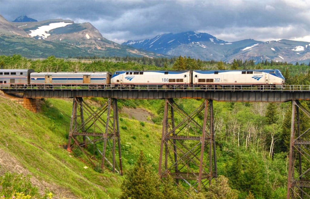 Amtrak's eastbound Empire Builder crosses the trestle over Two Medicine River in Montana.