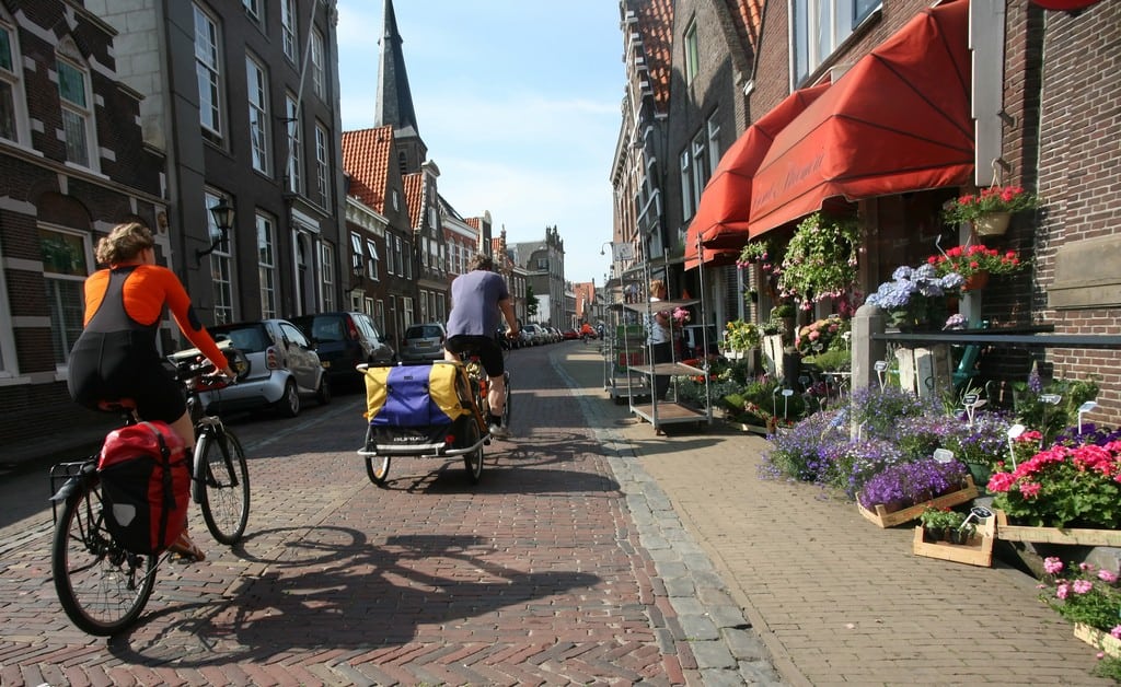 Tourists cycle through Monnickendam, a North Holland city located a 20-minute drive from Amsterdam. 