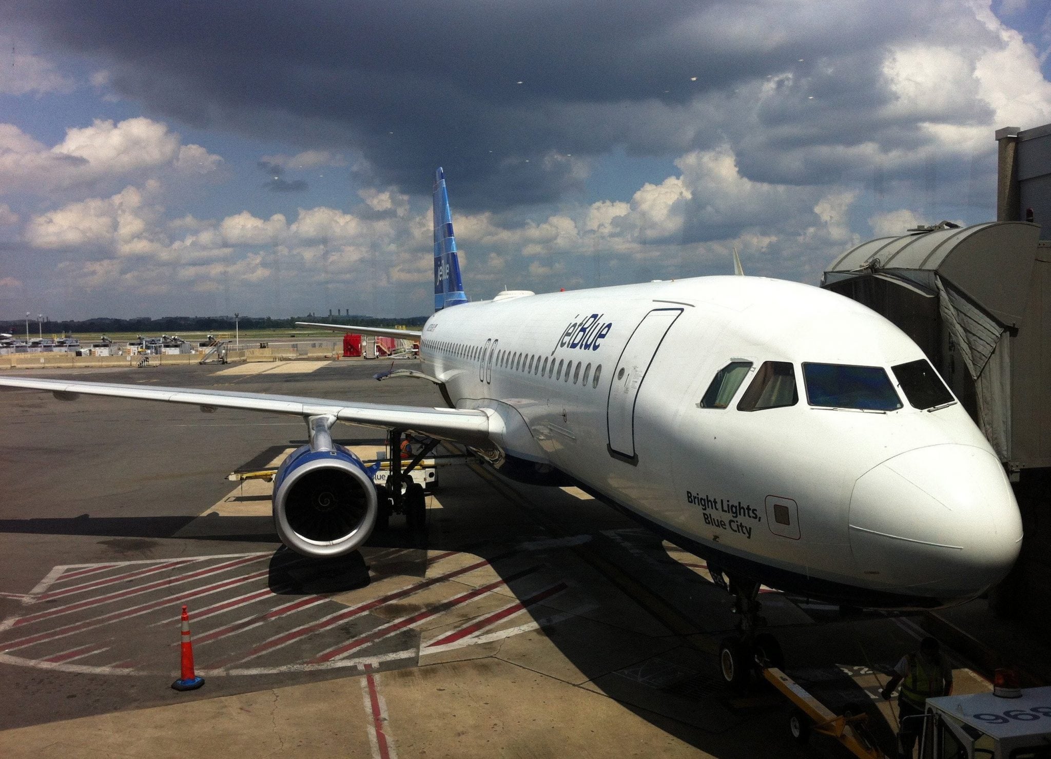 A Jet Blue Airways plane awaits at the gate for its Boston-bound passengers at Washington Reagan National Airport on July 31, 2012. 