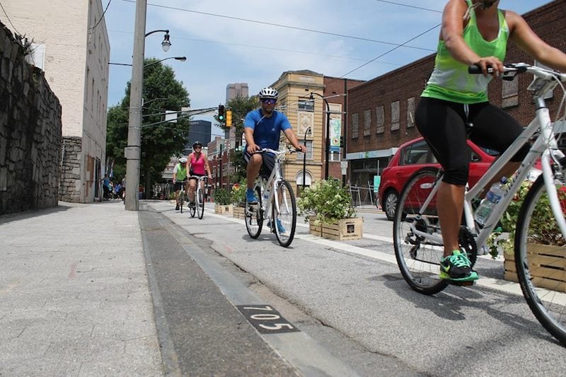 People using bike lanes on Auburn Avenue in Atlanta.