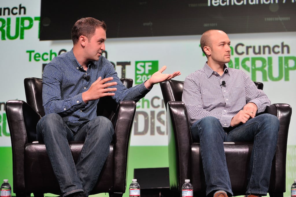 Lyft co-founders Logan Green and John Zimmer at TechCrunch Disrupt in 2013. 