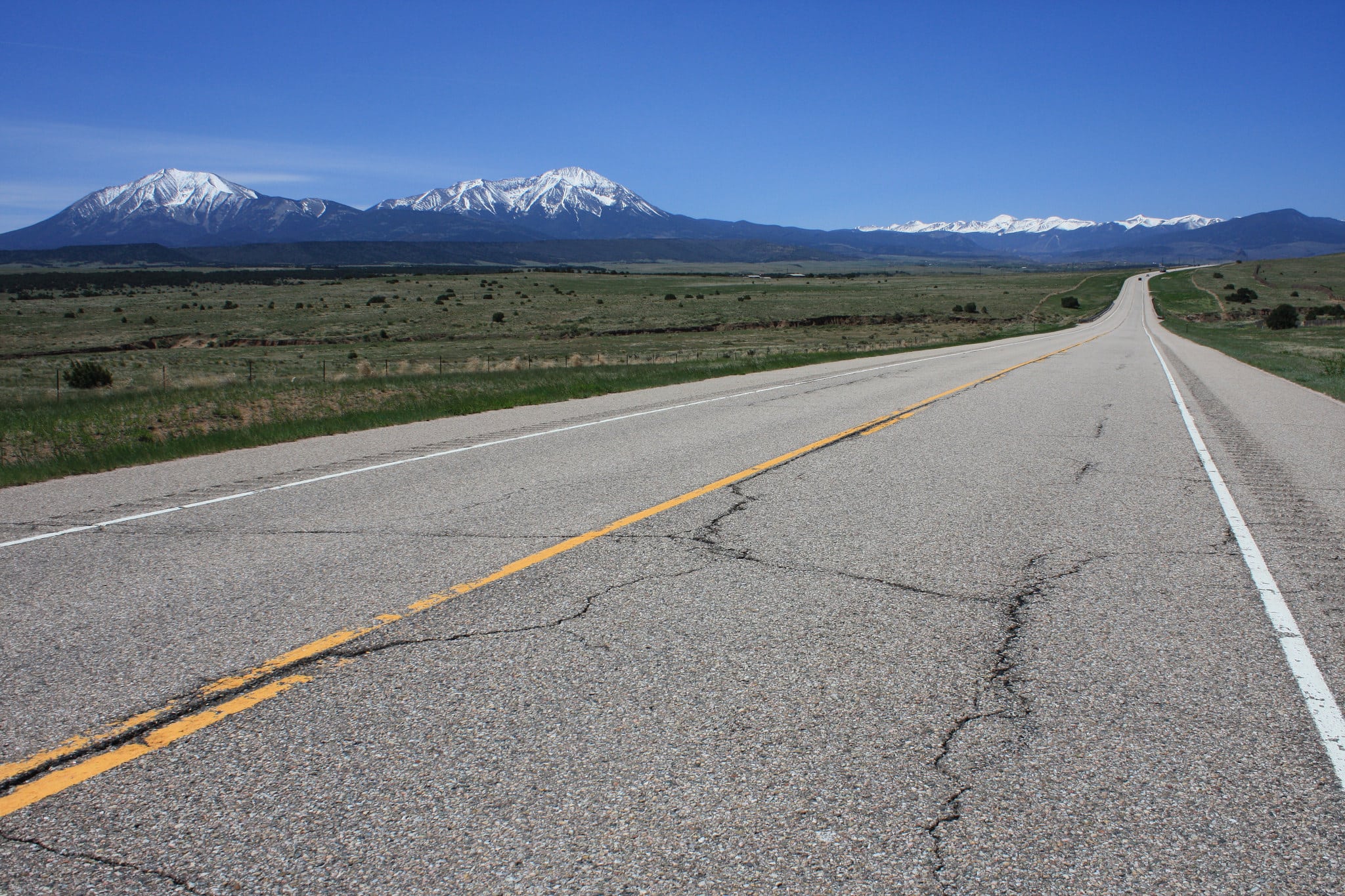 The Spanish Peaks and Trinchera Peak, taken from along U.S. 160, about 8 miles west of Walsenburg, Colorado.