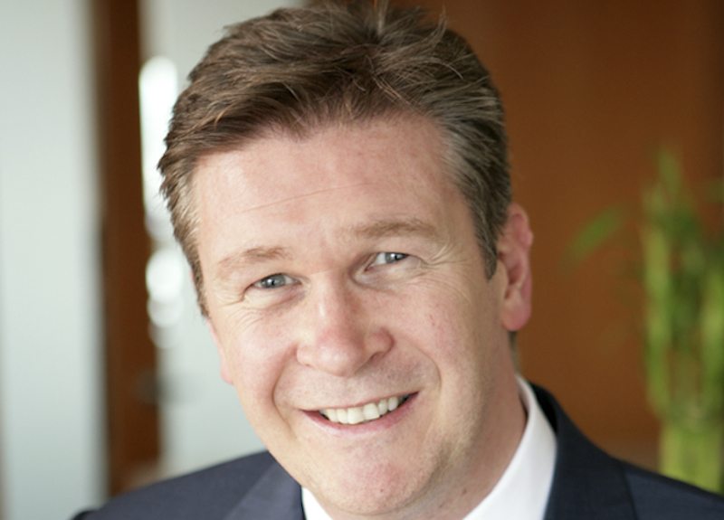 Travelport CEO Gordon Wilson is going to try and take the company public to pay down debt. 