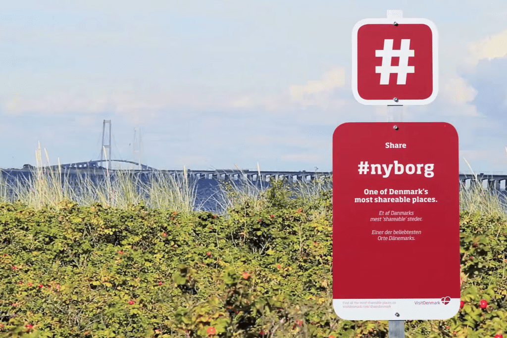 VisitDenmark places signs with hashtags at places of interest, making it easy for tourists to upload and share pictures from Danish destinations on social media.