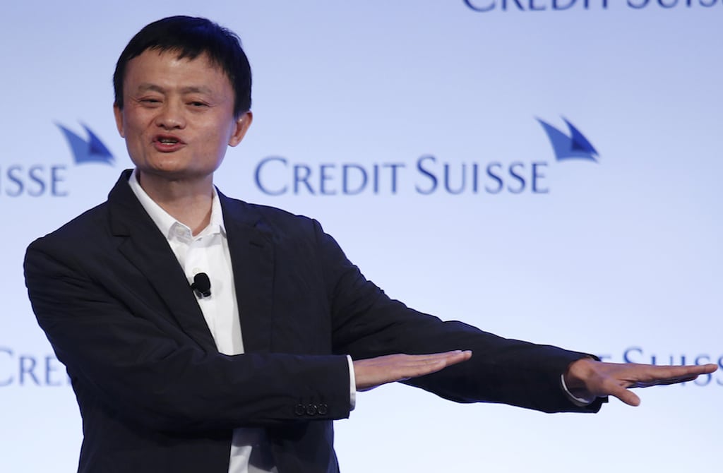In this March 20, 2012 file photo, Jack Ma, chairman of China's largest e-commerce firm Alibaba Group, gestures during a conference in Hong Kong.