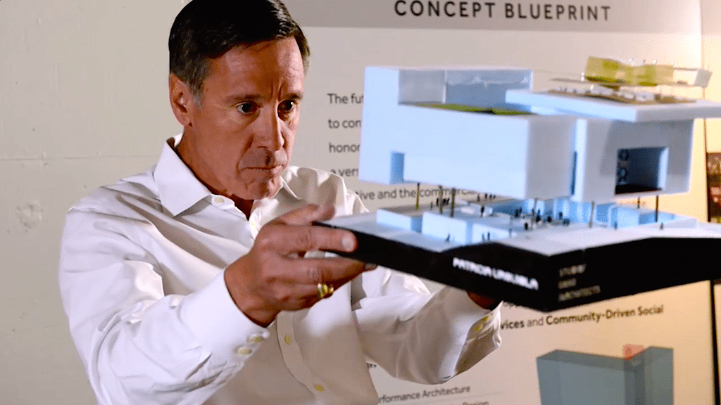 Marriott International CEO Arne Sorenson looks at a hotel prototype in the brand's innovation lab. 
