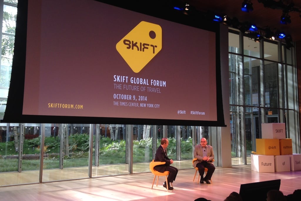 Moderator Henry Harteveldt (left) asks Mary St. George of JetBlue questions about the airline's evolution at  the Skift Global Forum in New York City on Oct. 9, 2014. 