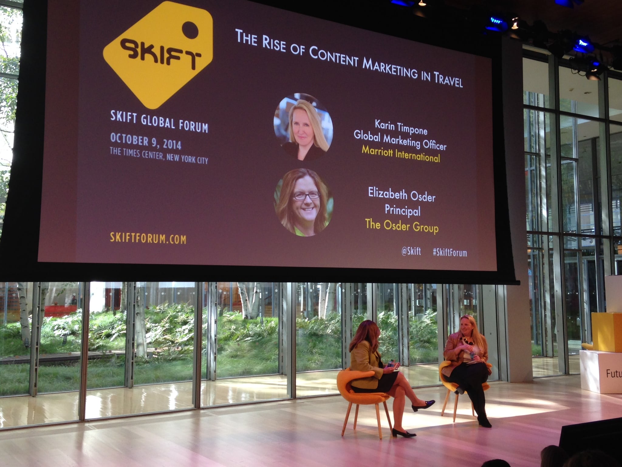 Karin Timpone (right) and moderator Elizabeth Osder speaking at Skift Global Forum in New York City on Oct. 9, 2014. 