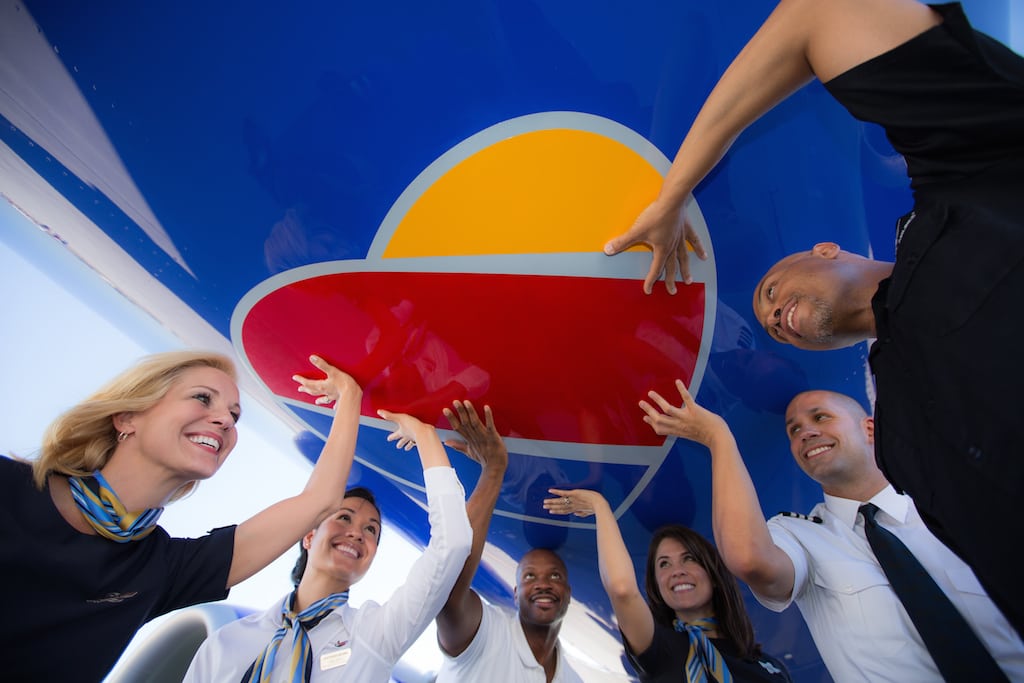 Southwest Air employees with the airline's new livery. 