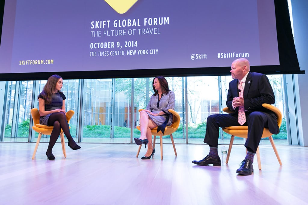 Samantha Shankman, Reporter at Skift (L), speaking with Cathy Tull, Chief Marketing Officer, Las Vegas Convention & Visitors Authority (M) and Will Seccombe, CEO of VisitFlorida (R) at the Skift Global Forum in New York City on October 9, 2014. 