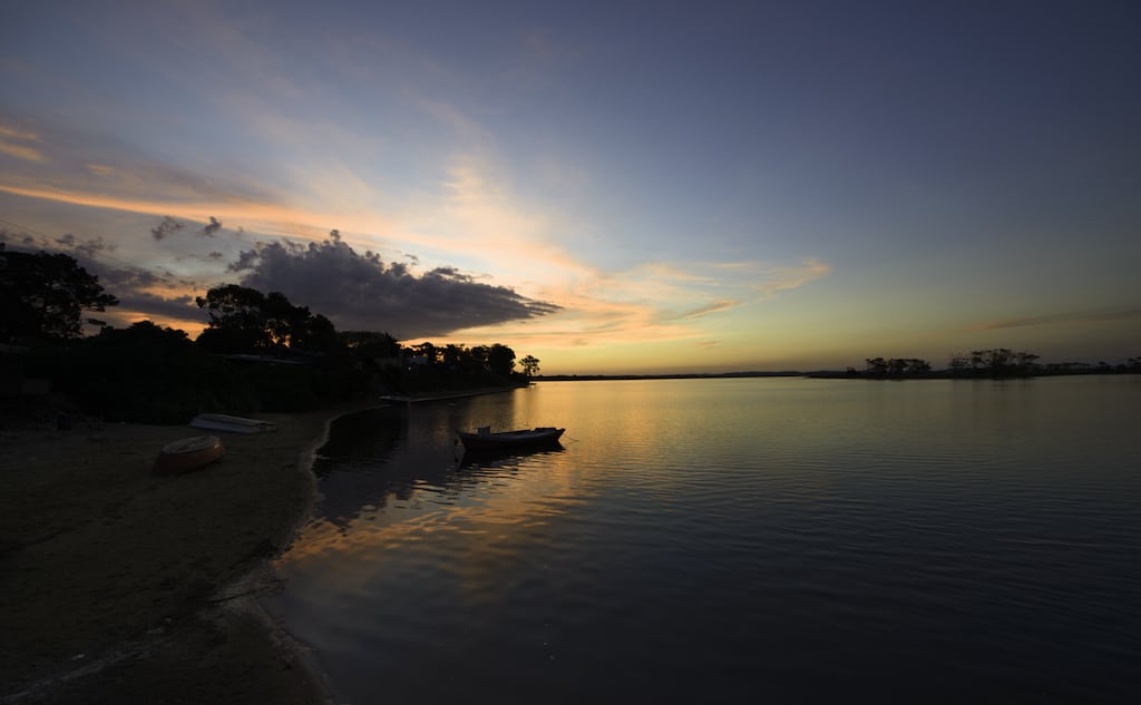 The sun sets over the water in Punta Del Este, Uruguay. 