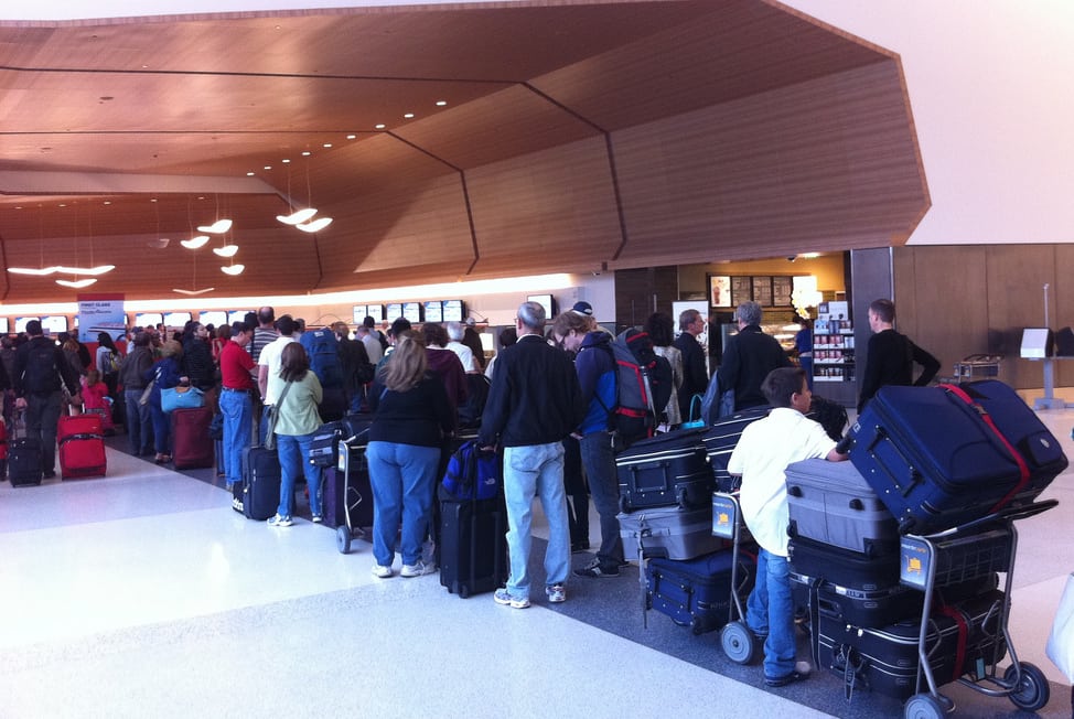 Passengers wait to check into flights at Fort Worth Meacham International Airport.