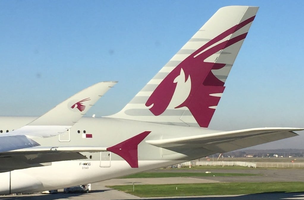View of Qatar's A350XWB sharklet parked next to Qatar's second A380.