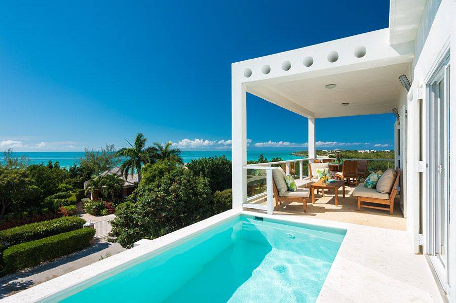 Some HomeAway property managers aren't particularly happy about HomeAway's optional commission-based business model. Pictured is a A HomeAway vacation rental on Taylor Bay in Turks and Caicos.
