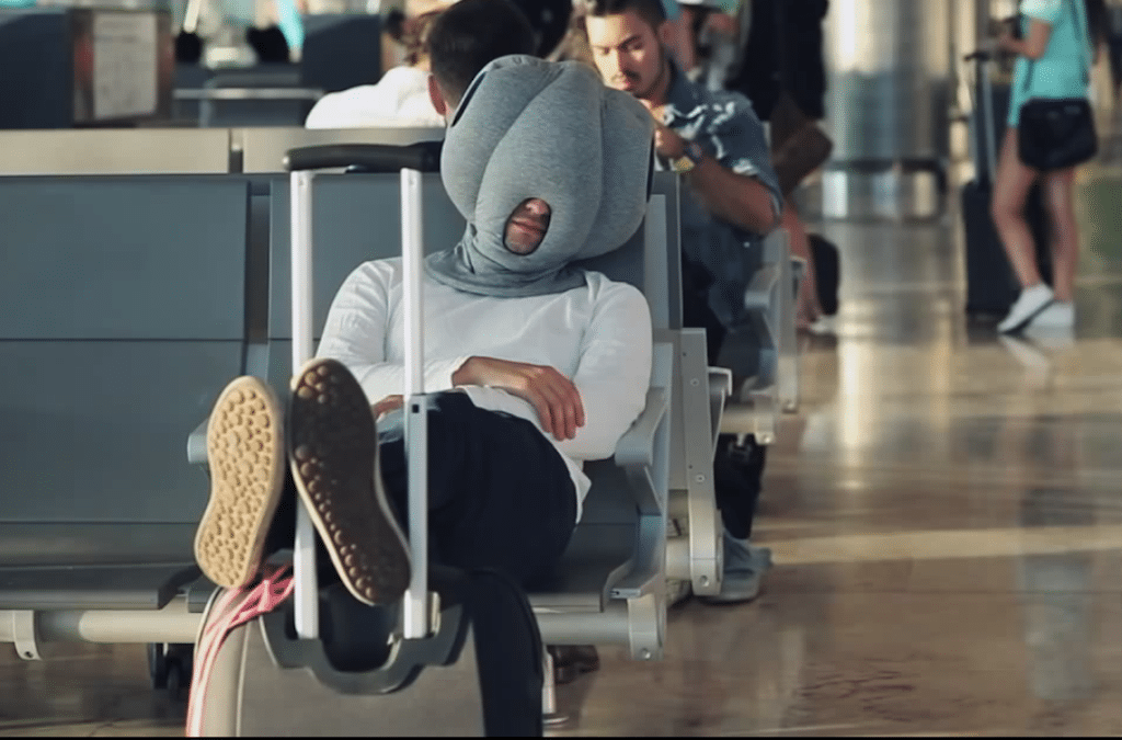 The Ostrich Pillow may be a nice option for some if you don't mind looking like a Teletubby when you travel.