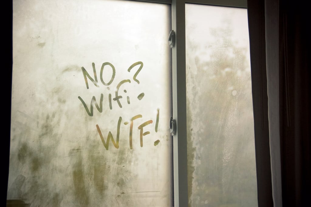 A customer leaves a message on the window of a Sheraton hotel room, in frustration.