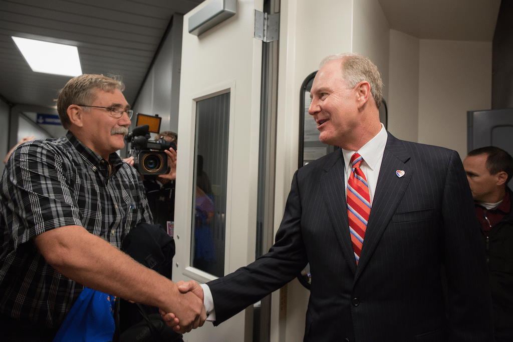 Southwest Airlines CEO Gary Kelly greets customers on the first non-stop flight out of Dallas Love Field. The Wright Amendment ended on Monday, Oct. 13 2014, allowing non-stop flights to anywhere in the U.S. from Dallas Love Field. 