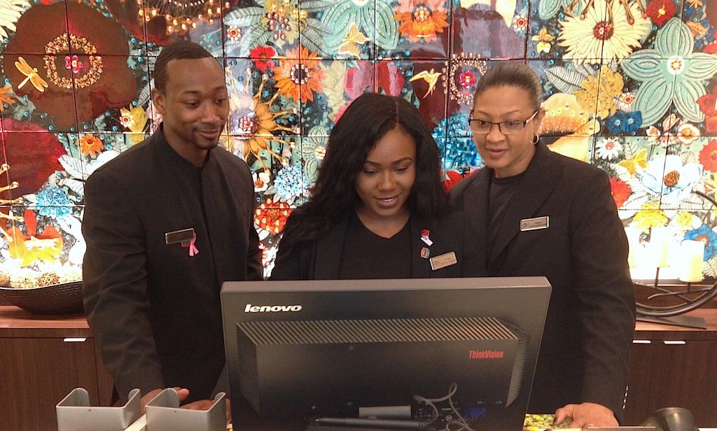 Front desk employees at work at the Courtyard New York Manhattan. 

