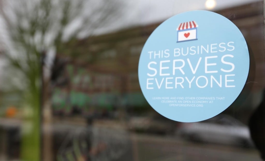 A window sticker on a downtown Indianapolis business, Wednesday, March 25, 2015, shows its objection to the Religious Freedom bill passed by the Indiana legislature. Organizers of a major gamers' convention and a large church gathering say they're considering moving events from Indianapolis over a bill that critics say could legalize discrimination against gays. 