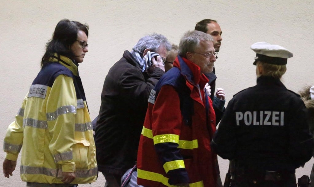 Social workers and relatives of the victims of the Germanwings plane crash arrive at the airport in Duesseldorf, Germany, Thursday, March 26, 2015, to depart on a special flight, offered by Lufthansa airline, to Marseille, southern France. They are planning to visit the crash site in the French Alps near Seyne-les-Alpes. 