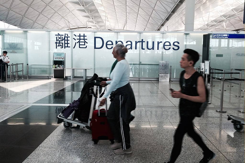 Passengers at the departures hall at Hong Kong’s international airport. Over 50 customers are waiting for refunds from Zuji.