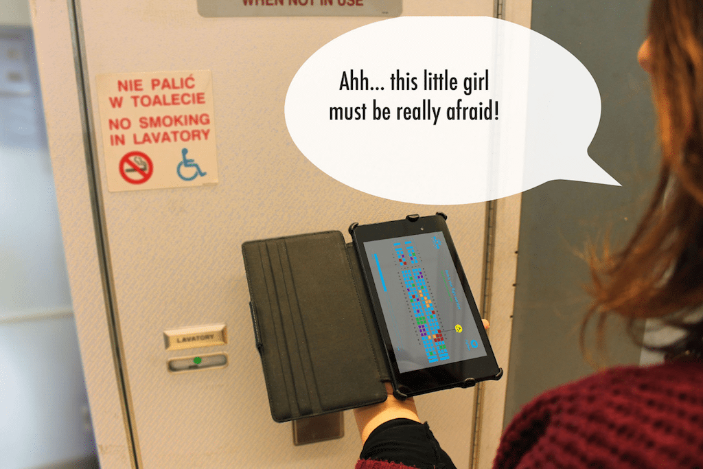 A crew member checks FlightBeat to get a sense of the mood in the cabin.