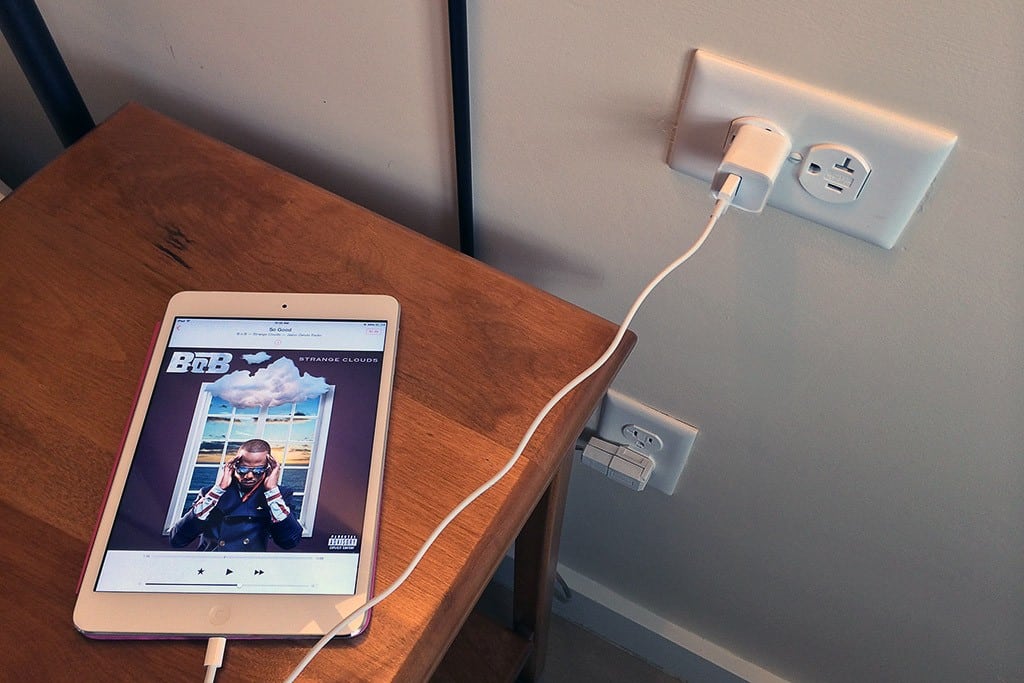 An iPad plugged into a night-stand level plug at the Weekapaug Inn in Rhode Island. Free Wi-Fi is something a majority of hoteliers offer to guests today, according to a new American Hotel & Lodging Association survey.  