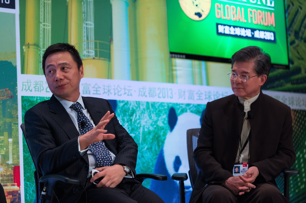 Vincent Lo, Chairman, Shui On Group (right), Min Fan (left) Ctrip co-founder. 