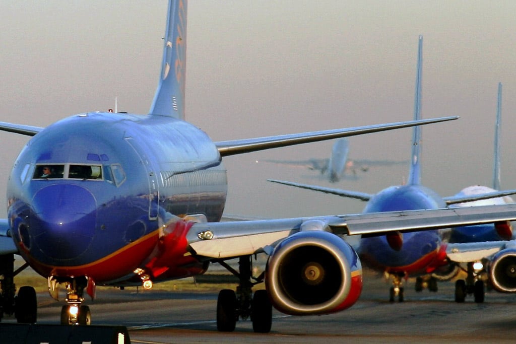 Planes line up at Los Angeles International Airport. 