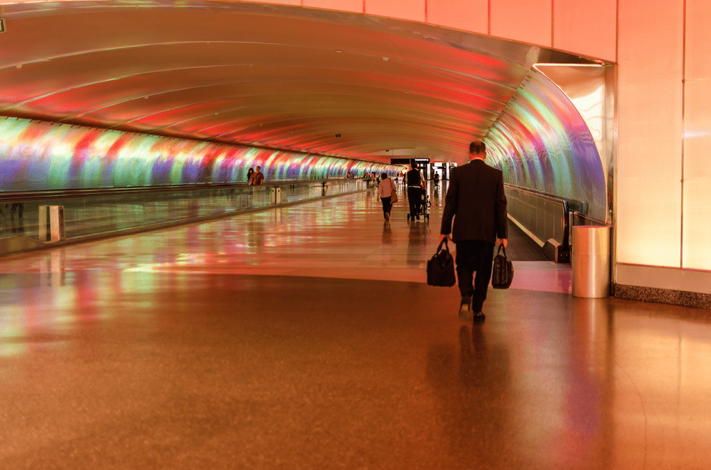 A traveler walks through Detroit Metropolitan Wayne County Airport.