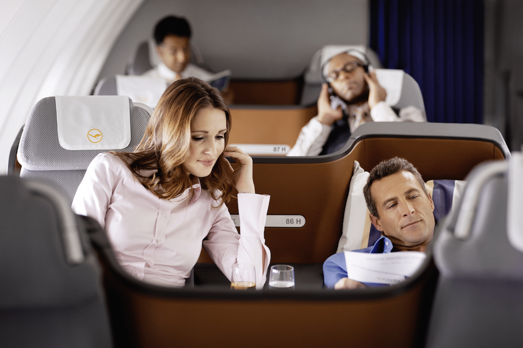Travelers can now purchase advance seats on Lufthansa Group flights through CheapOair, the first third-party site to get the capability. Pictured are passengers in Lufthansa business class seats.