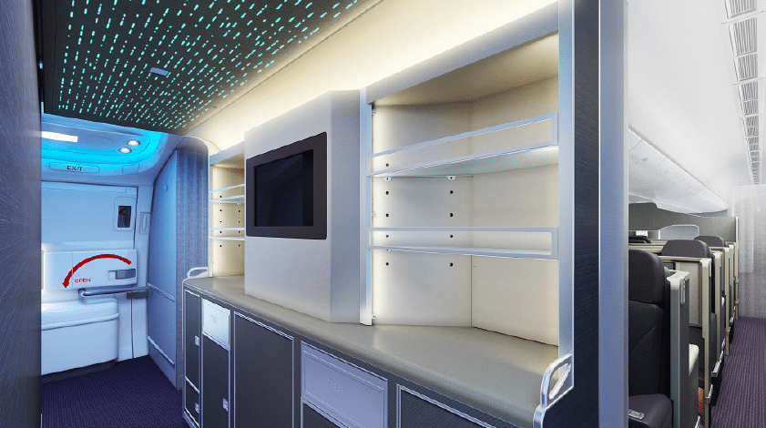 American Compensates for the lack of a lounge on the 777-200 by providing an attractive walkup bar, which also serves to disguise unattractive galleys and is a better welcome on board for passengers–that’s hospitality well applied. 