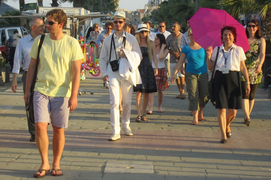 A tour group walks through Larnaca, Cyprus.