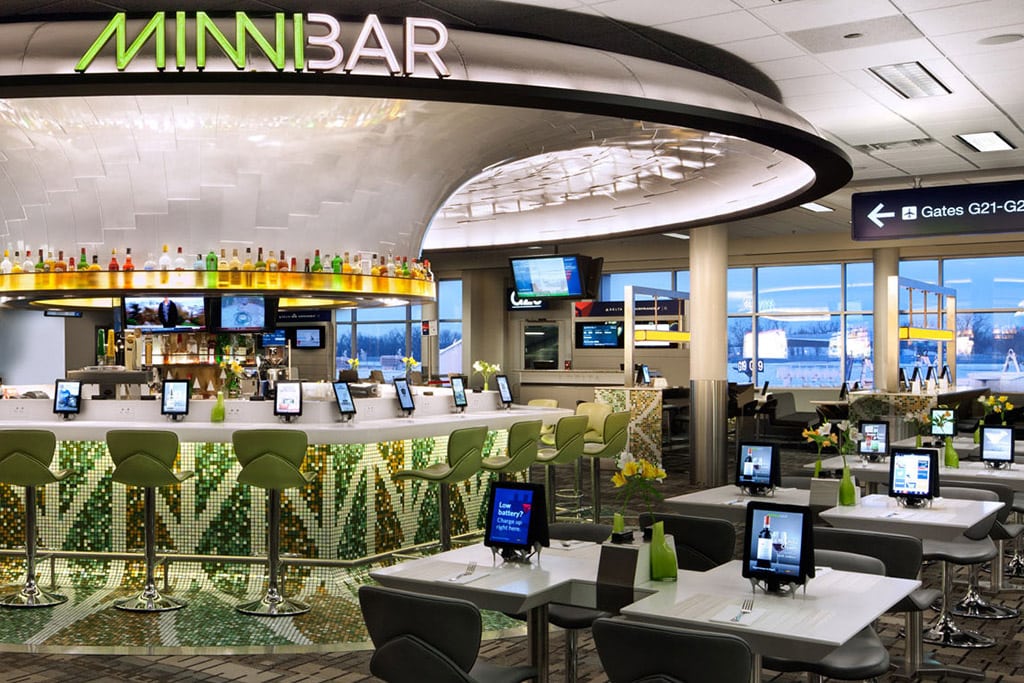 Rendering of an airport bar with iPad tablets from OTG. 