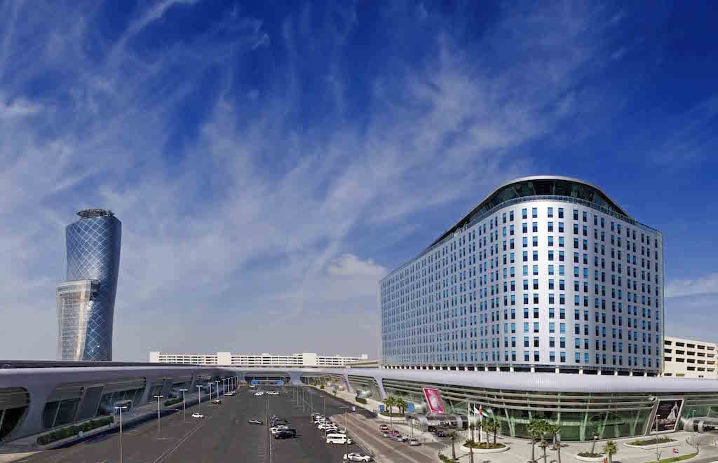 Abu Dhabi National Exhibition Centre (right) and Hyatt Capital Gate (left).