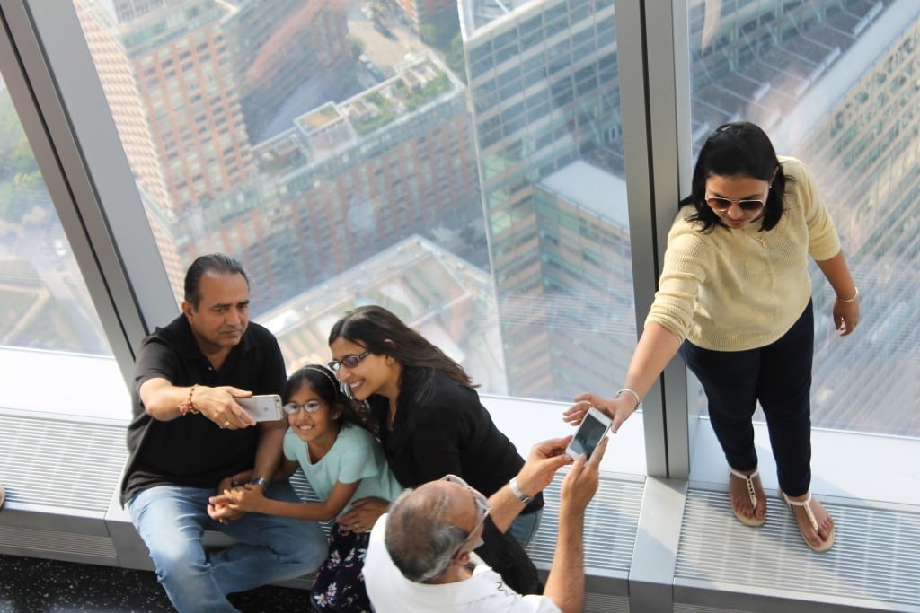 Travelers at the One World Trade Center Observatory in New York City.