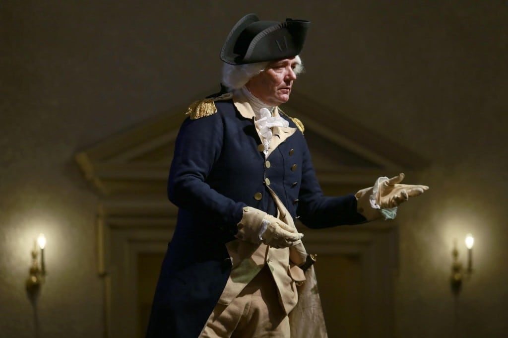 Ron Carnegie, portraying George Washington, takes the stage in Colonial Williamsburg, Va., to announce he is hitting the 2016 presidential campaign trail. 
