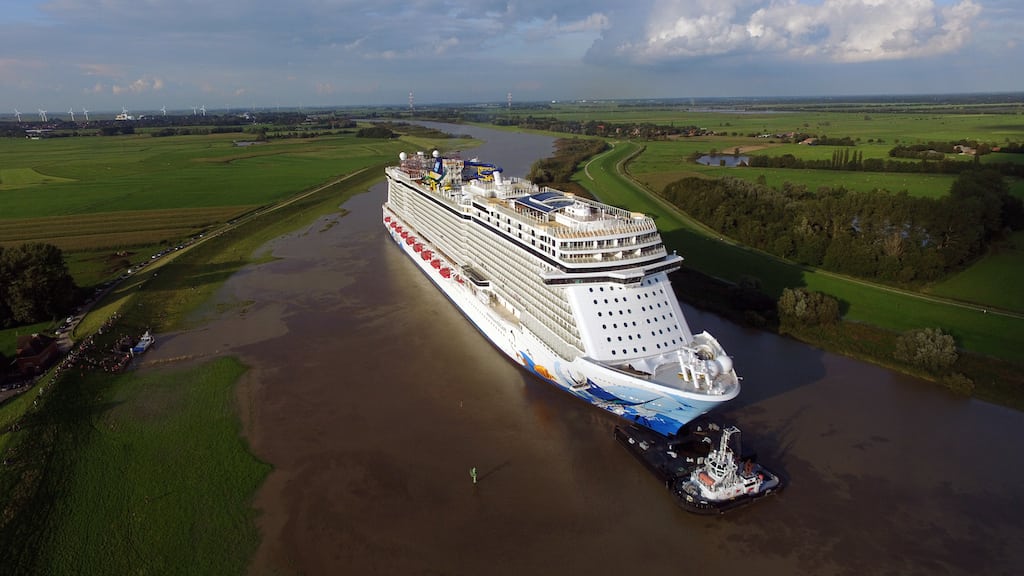 The Norwegian Escape floats down the Ems River on its way to the Netherlands.