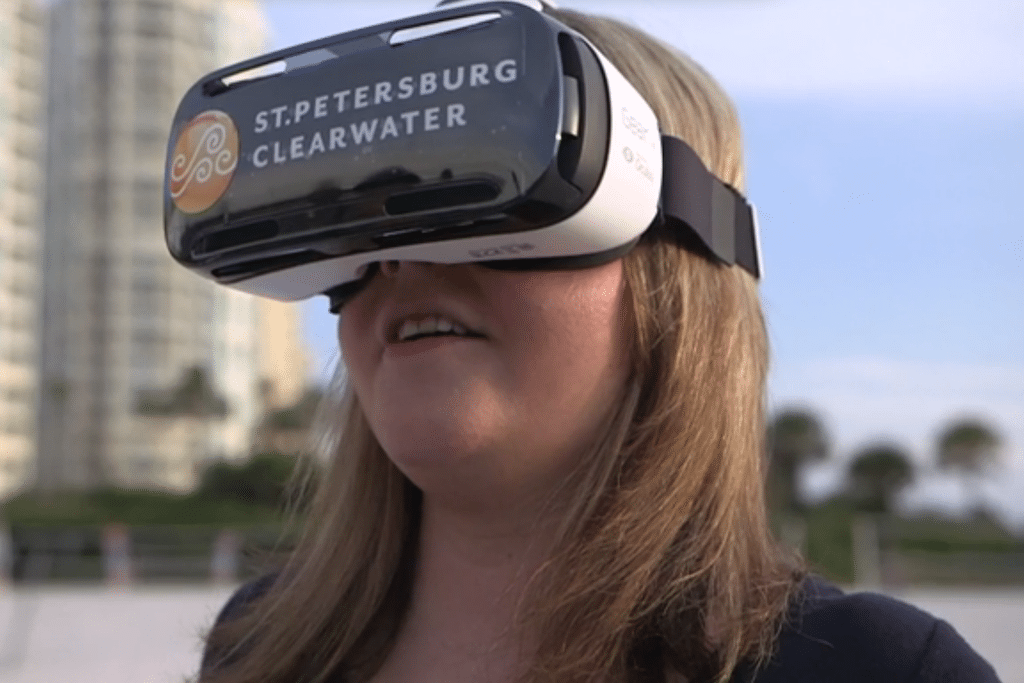 A traveler demos Visit St. Petersburg/Clearwater's virtual reality headsets.